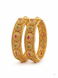 Gold-plated temple jewelry-style bangle.